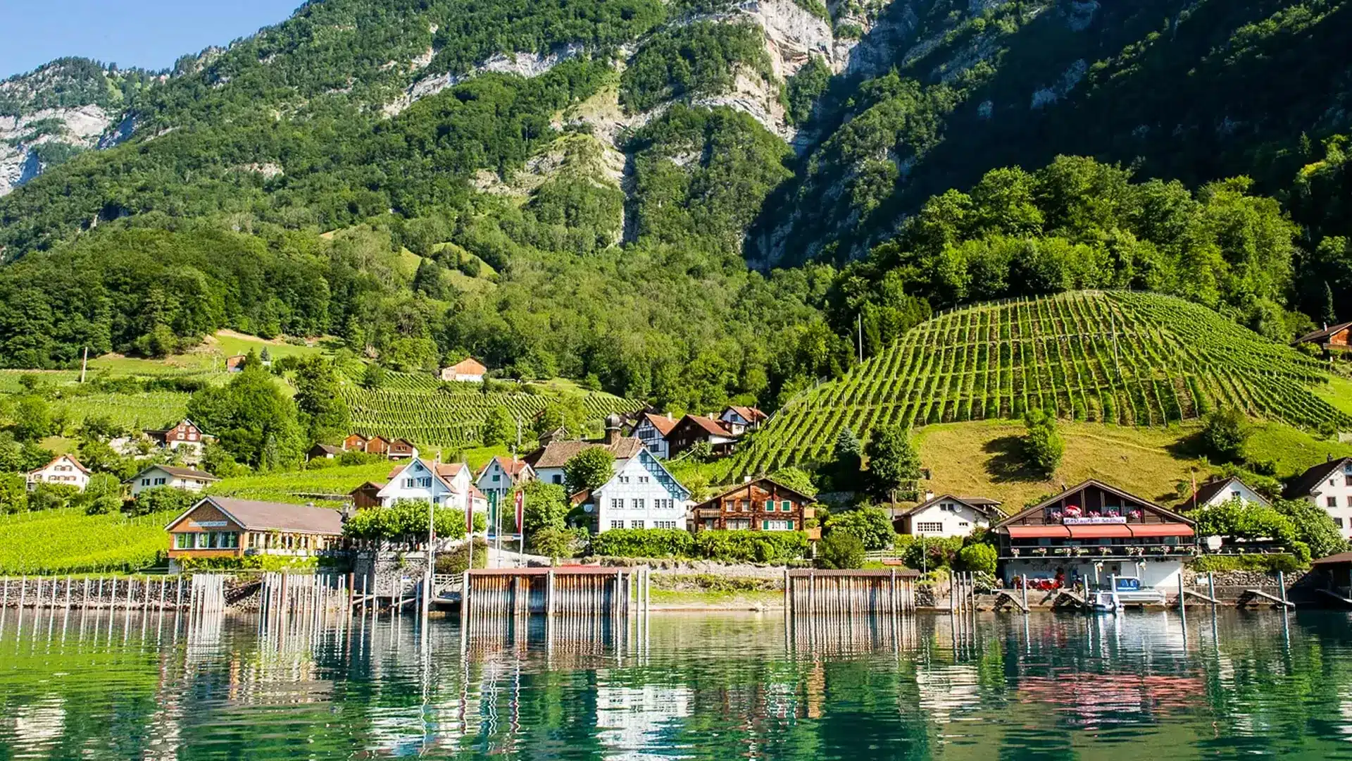 The village of Quinten on Lake Walen with its green slopes and beautiful houses.